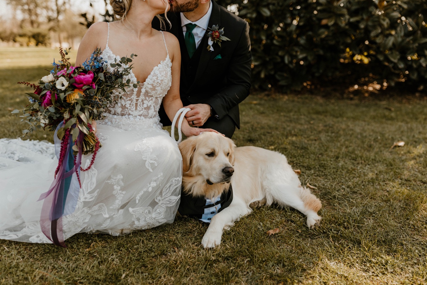 bride and groom wedding portraits with dog