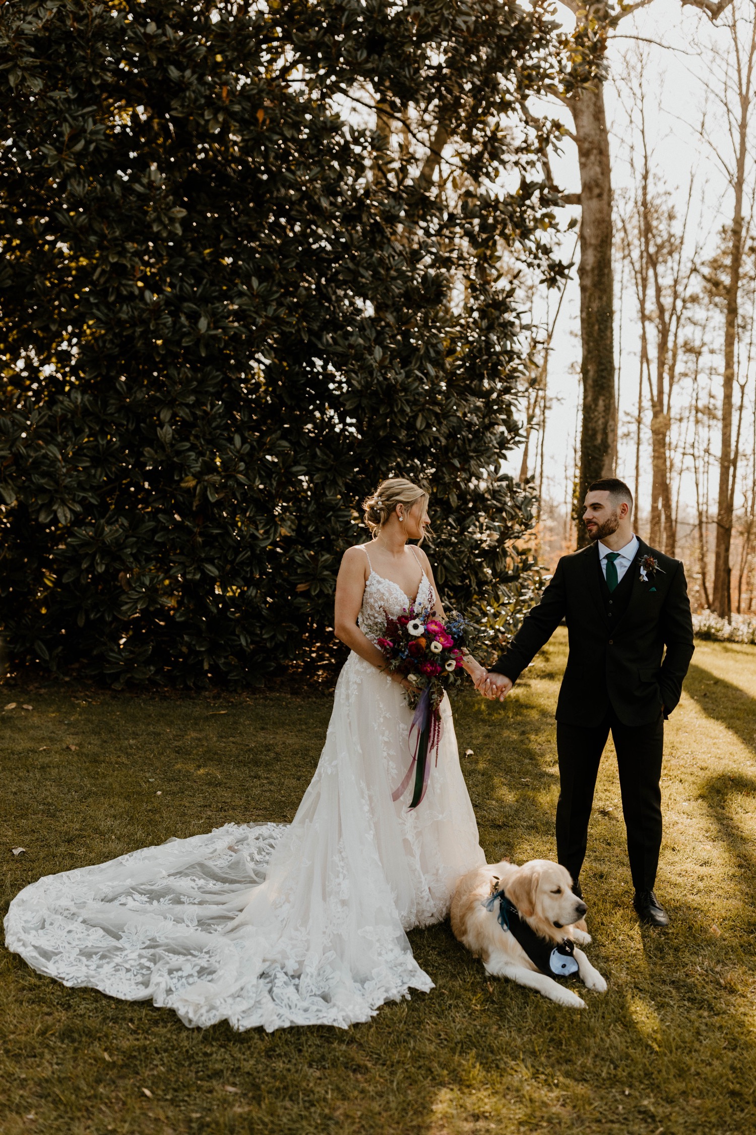 bride and groom wedding portraits with dog
