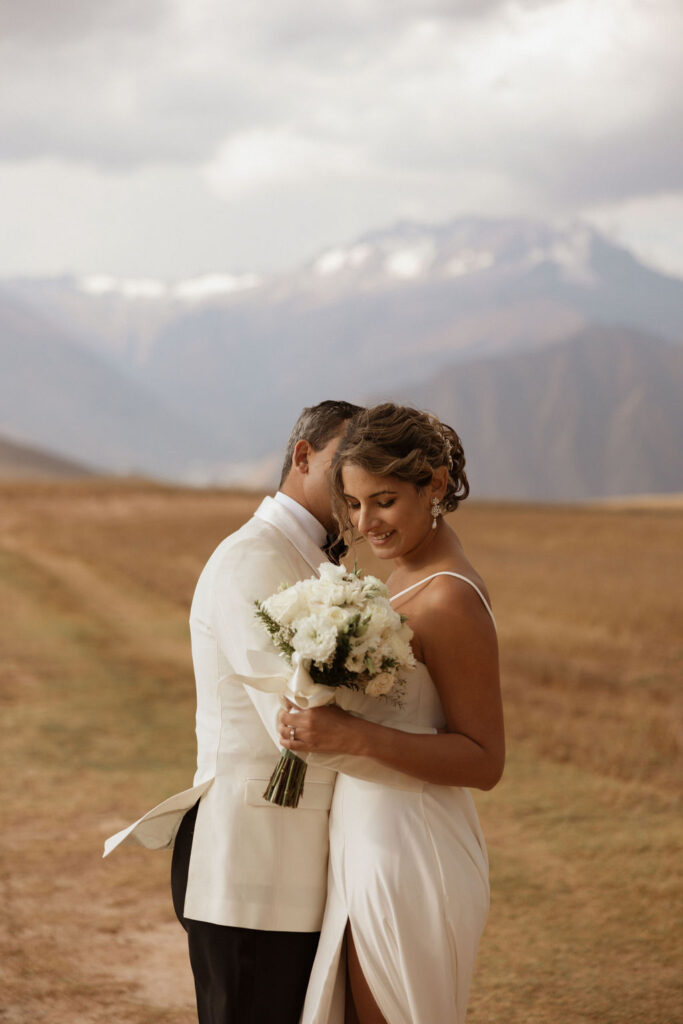 Bride and groom photos in the mountains of Peru after their wedding ceremony